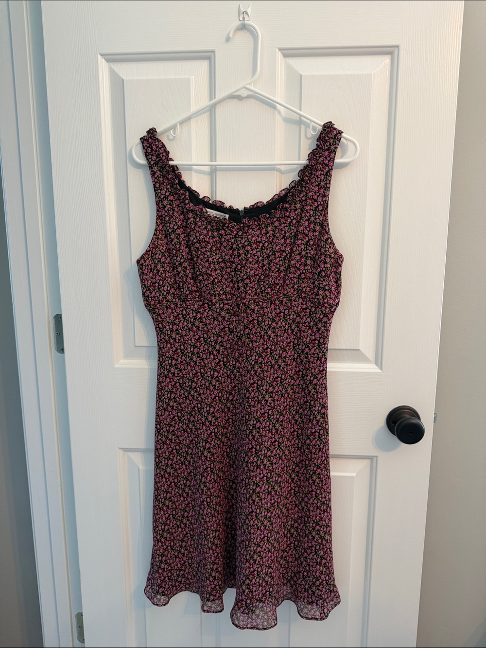 Black Mini Dress with Pink Floral Print and Ruffle Neckline